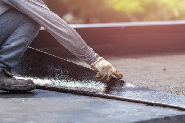 Professional Basement Waterproofing technician working in Wawaka, IN
